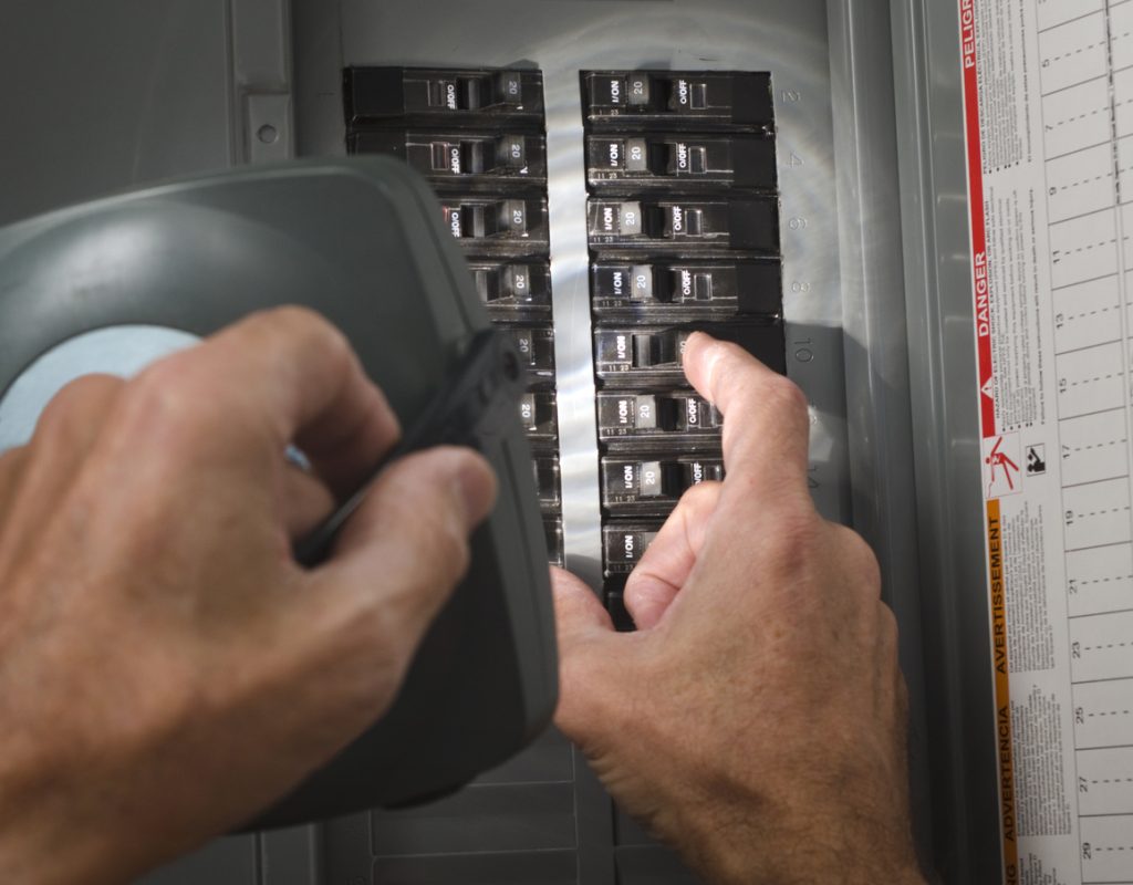 man throwing circuit breaker